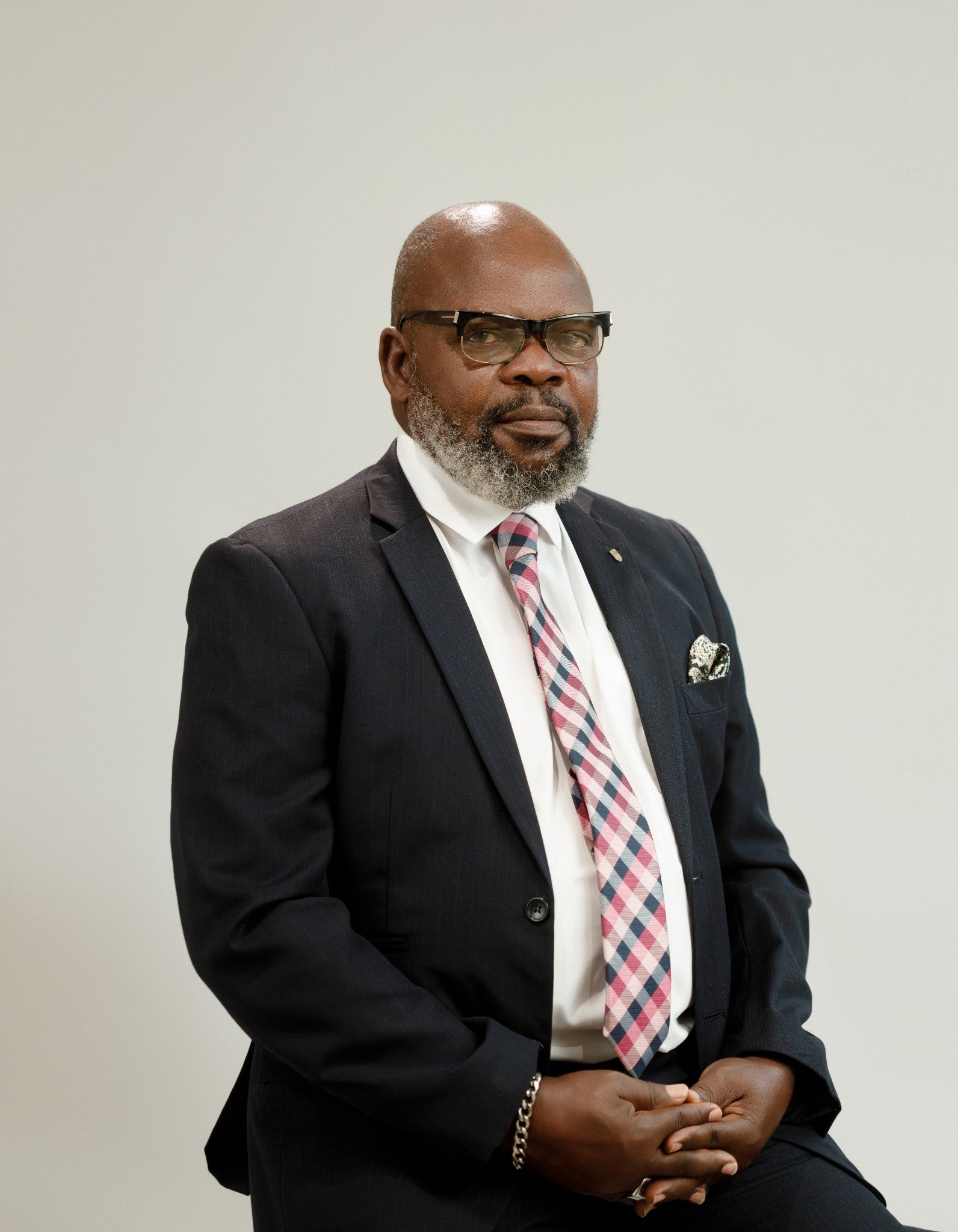 Dr. S. Bhadmus Abudu, B.Sc., FCTI, FCA, Dr. FCISCSM